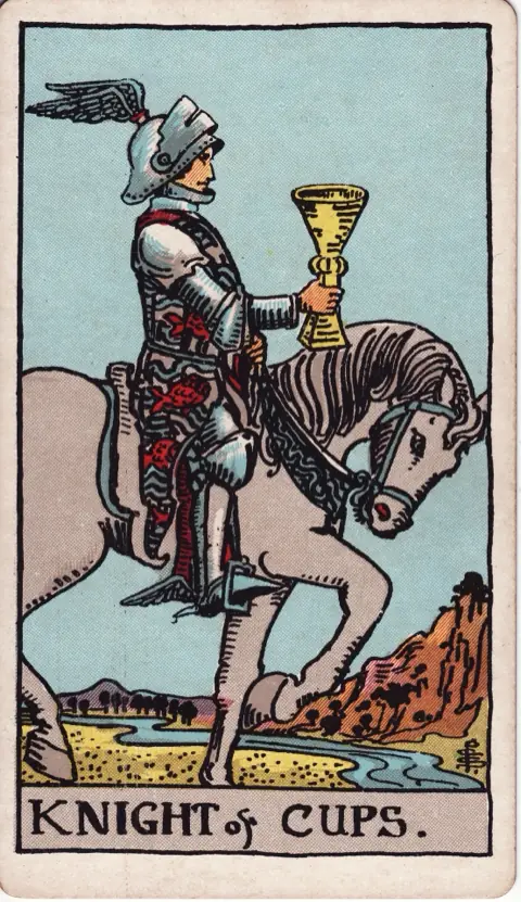 Knight of Cups, from the 1909 Rider-Waite-Smith deck: a knight in a winged helmet rides a calm white horse at a walk, holding a cup out in front of him, a river ahead.