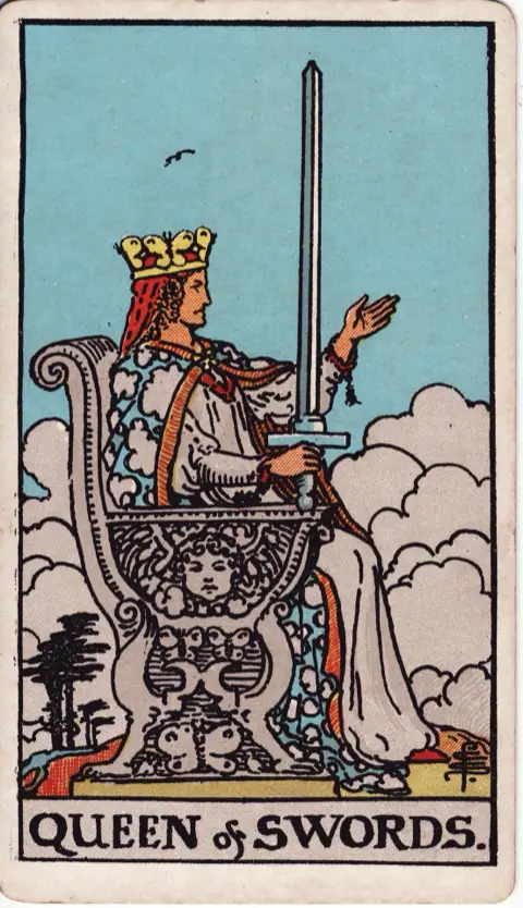 Queen of Swords, from the 1909 Rider-Waite-Smith deck: a queen on a throne carved with butterflies holds an upright sword in her right hand and lifts her left, clouds below her and a single bird above.